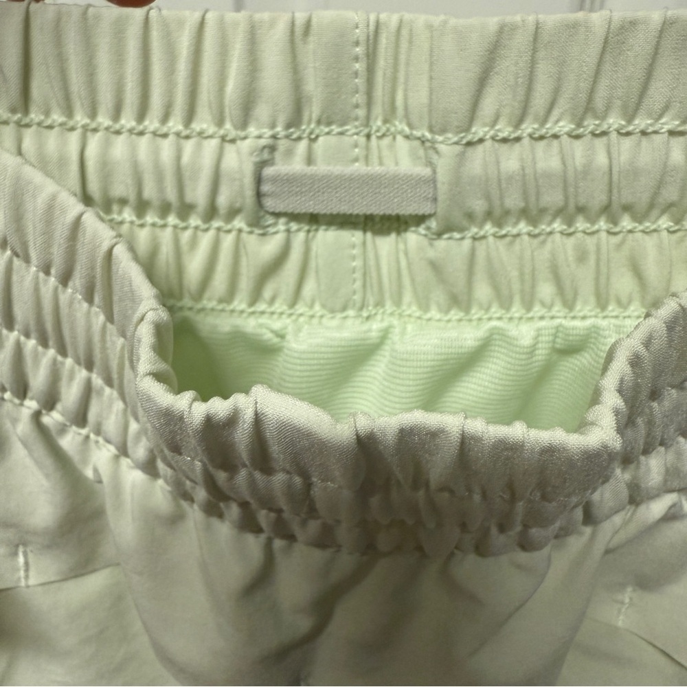 Athleta| EUC Calypso Green Hustle 3” Athletic Shorts in Size Small - Picture 5 of 8